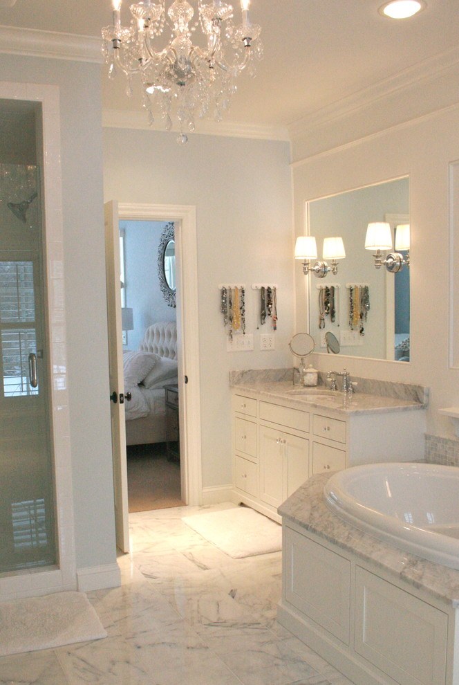 marble bathroom with hot tub