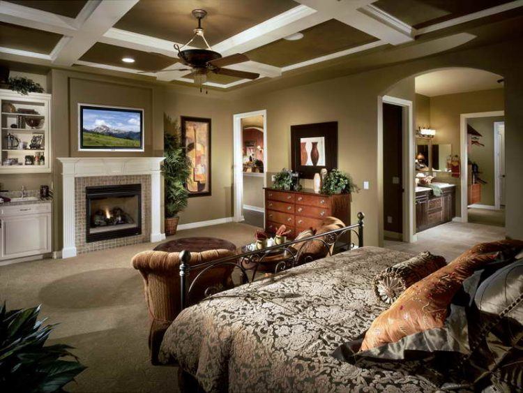 master bedroom with flatscreen tv and fireplace