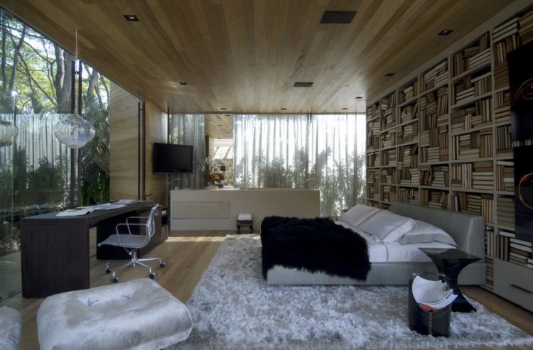 bedroom-with-interior-glass-wall-completed-with-desk-and-wall-bookcase-cabinet