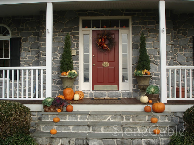 beautiful fall themed front porch