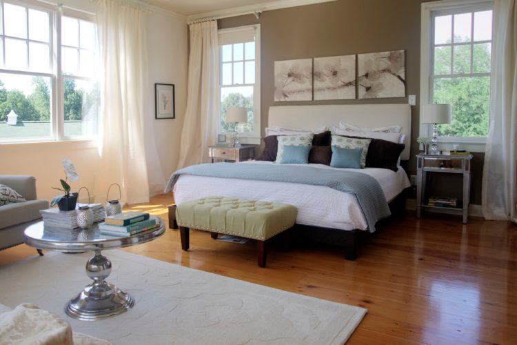 bedroom with beautiful wood flooring