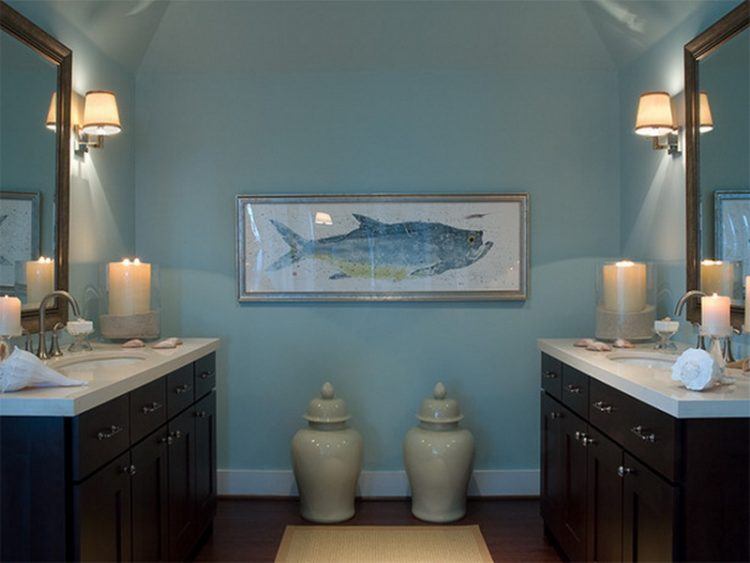 bathroom with fish wall art