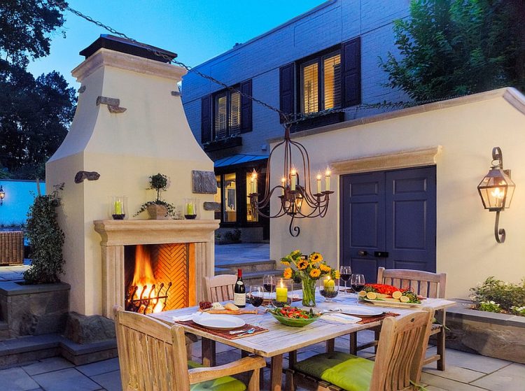 outdoor dining space with fireplace