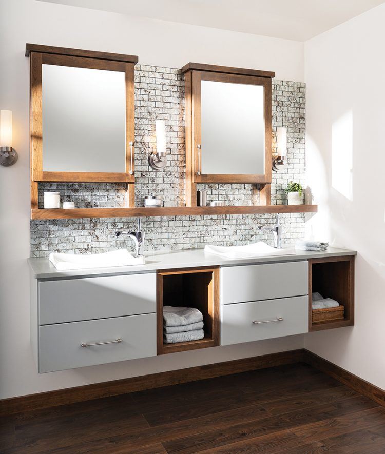 bathroom with white brick wall