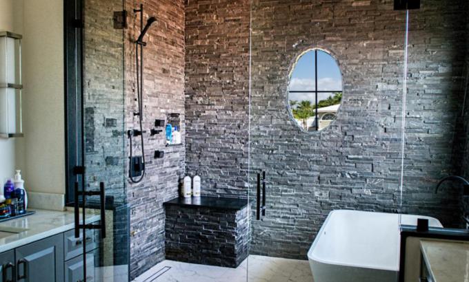 beautiful glass enclosed stone shower