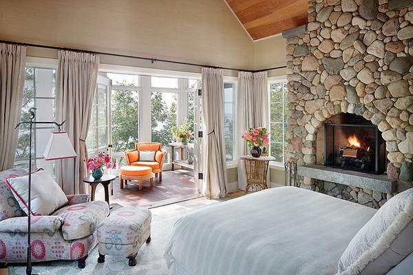 beautiful fireplace with stone wall