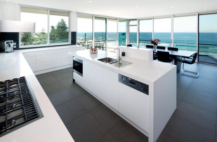 white kitchen with ocean view