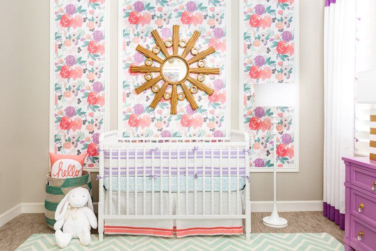 baby room with bright wall art