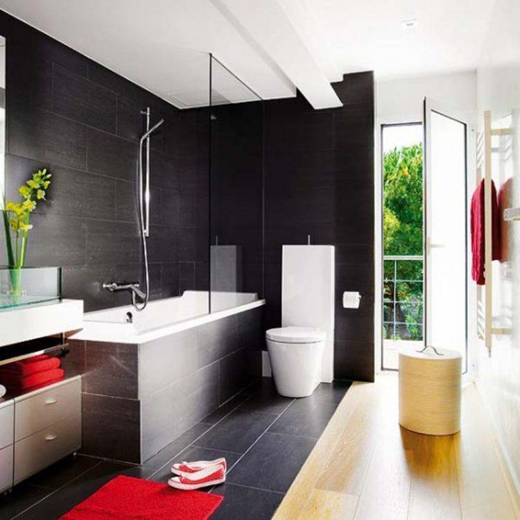 all black bathroom with red accent