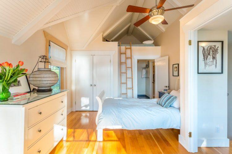 bedroom with beach style design and wood floor