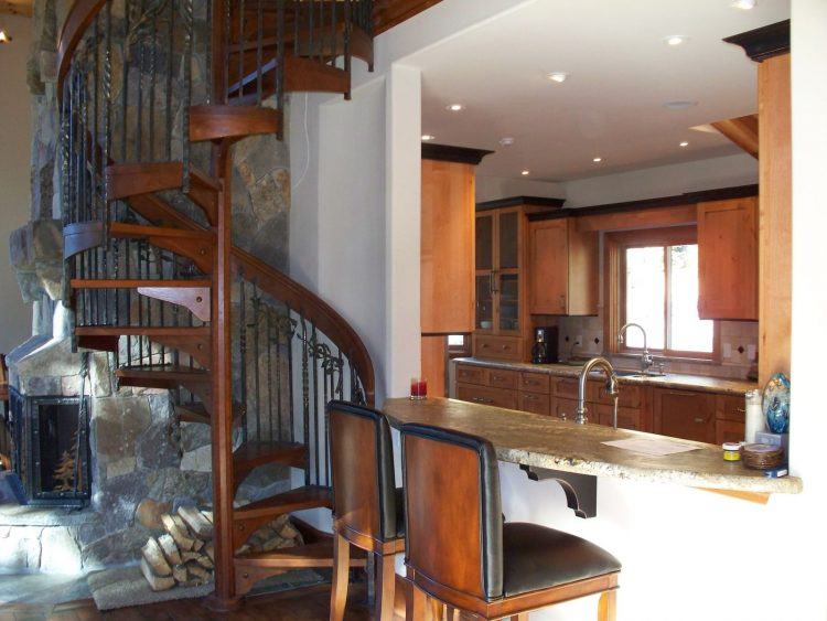 modern staircase in kitchen area 