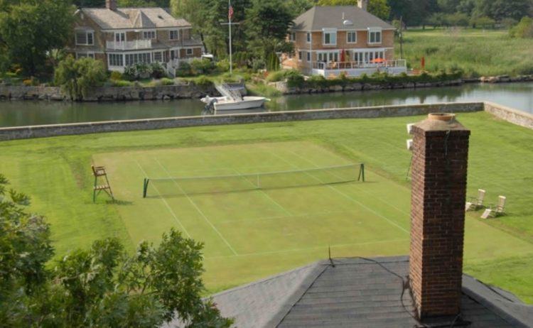 beautiful grass tennis court near water