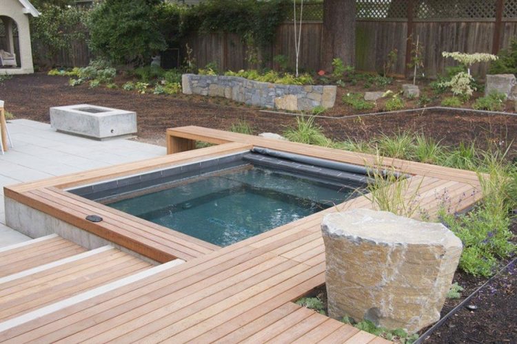 backyard hot tub with wood build