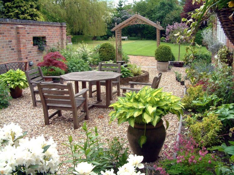 outdoor sitting area with brick flooring