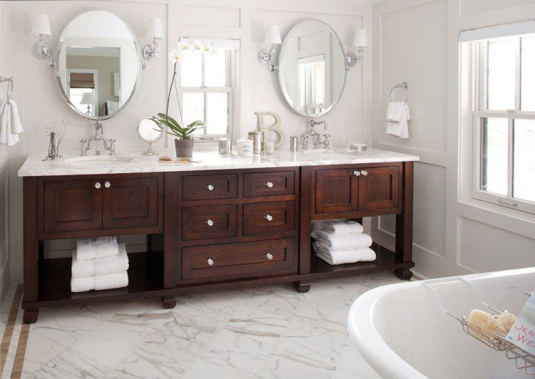 bathroom with brown wooden vanity