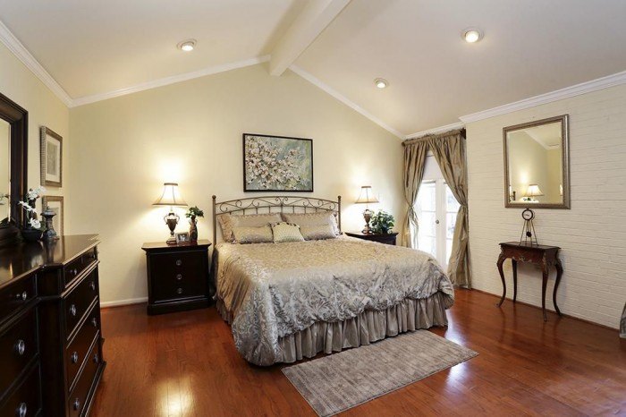 bedroom with exposed ceiling beam