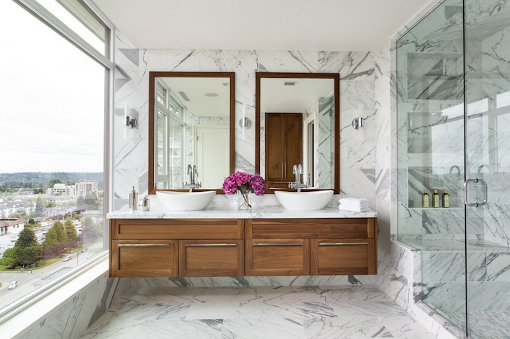 bathroom with marble style wall