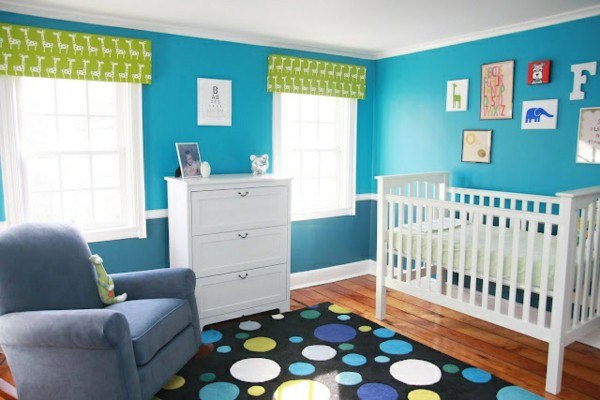 beautiful bright blue room with green window treatment