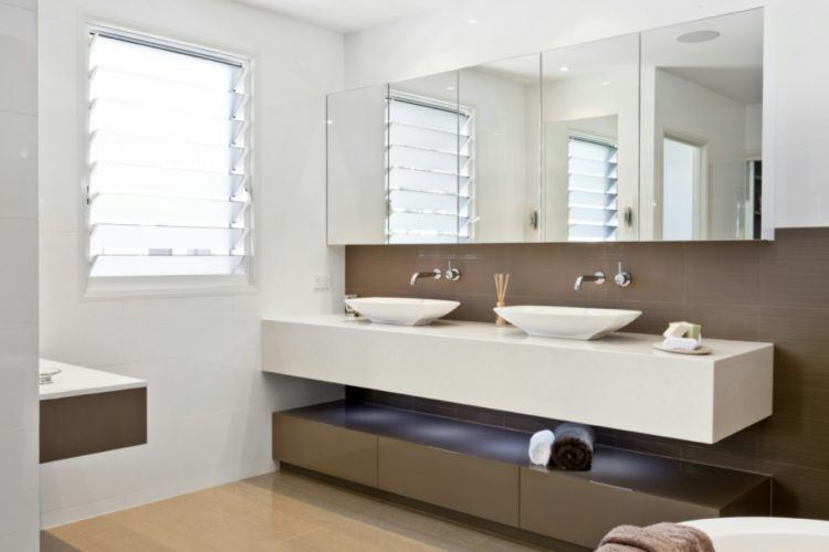 bathroom with two vessel sinks