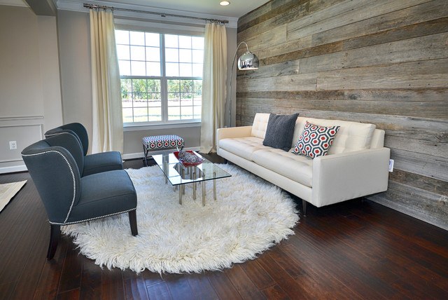 contemporary living room with wood floor and wall