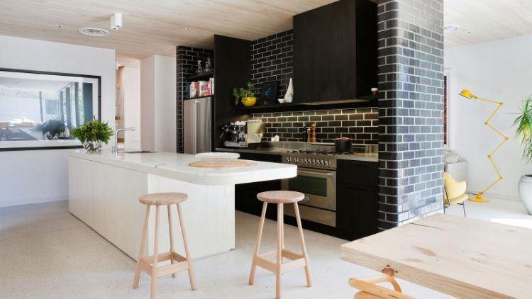 kitchen with black brick wall