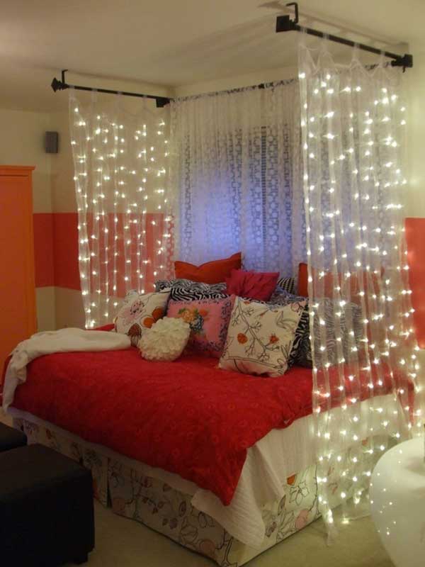 canopy bed with lights in teen's room