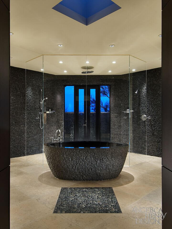 beautiful modern master bathroom with round tub