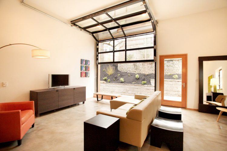 garage living room with leather furniture