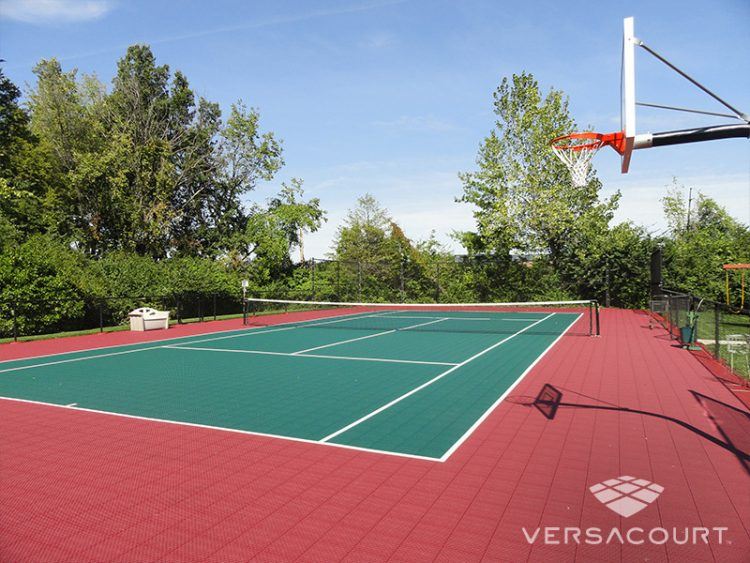 home tennis court with basketball hoop on side