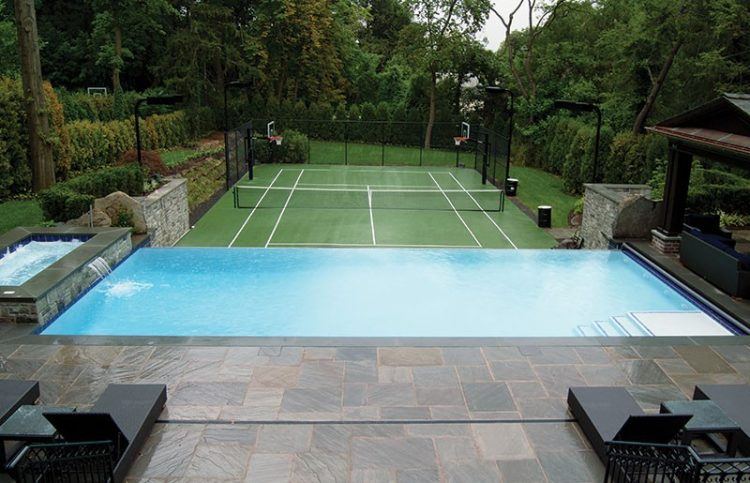 home tennis court near infinity pool