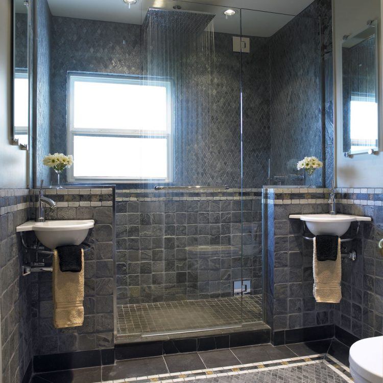 contemporary bathroom with stone wall