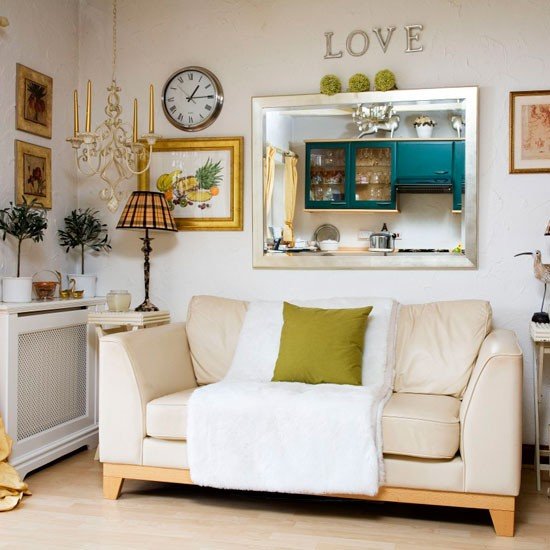 living room with mirror on wall