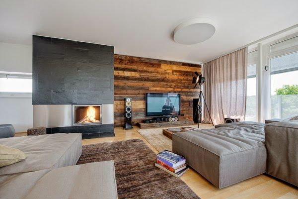 contemporary living room with fireplace and wood floors