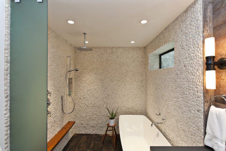 all white pebble stone shower 