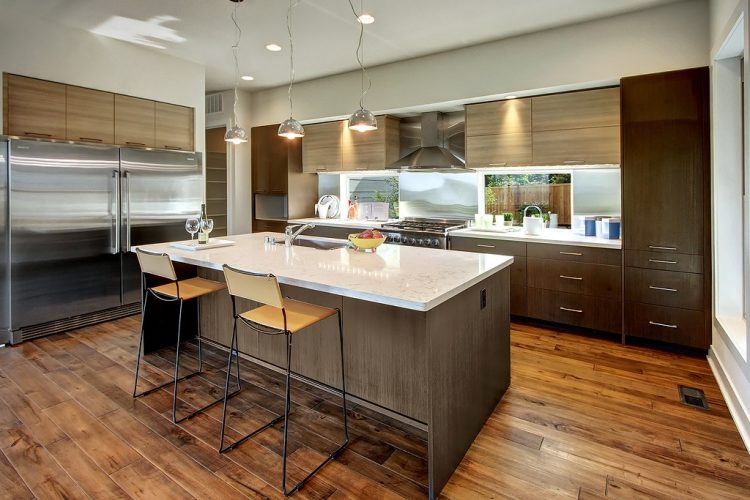 beautifully renovated kitchen with wood floors