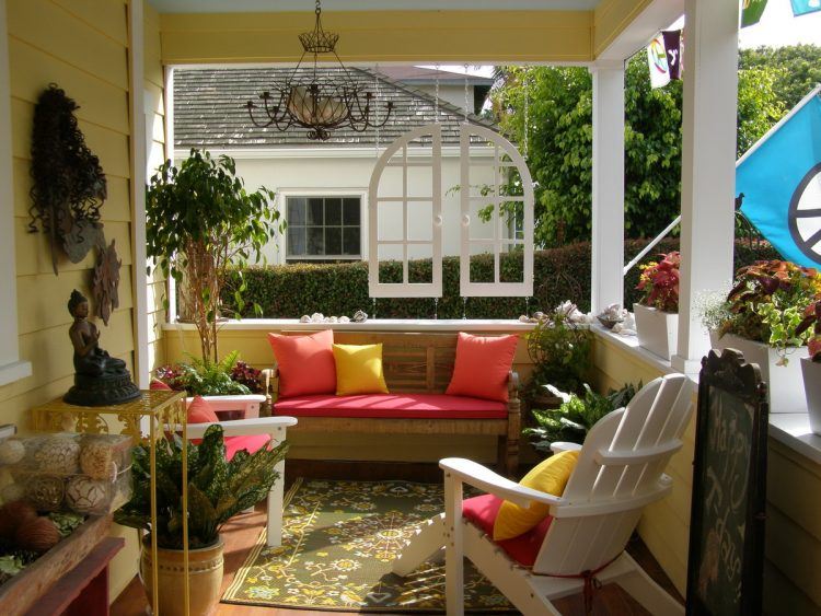 beautiful front porch with colorful pillows