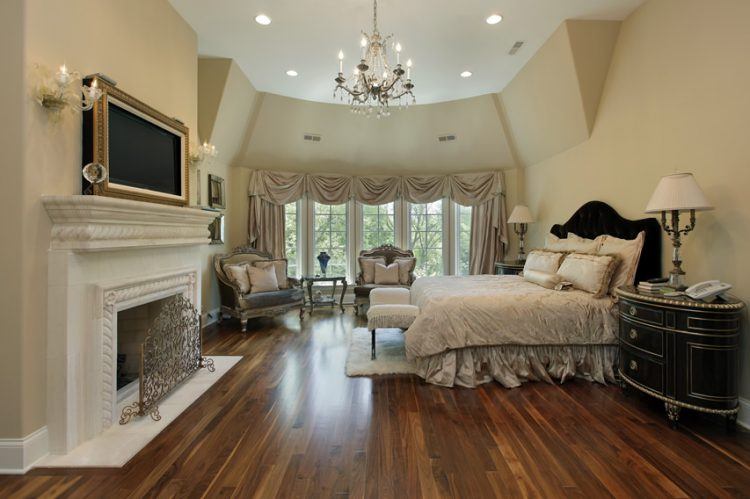 master bedroom with hardwood flooring