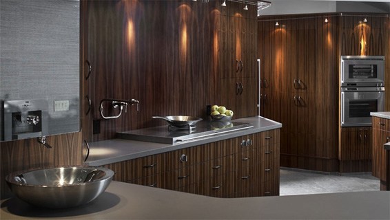 beautiful kitchen with dark cabinets