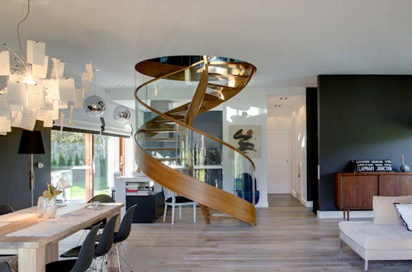 living room with wooden spiral staircase