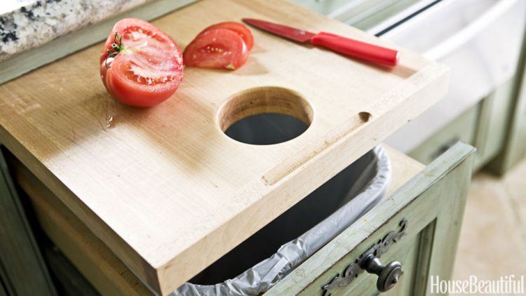 cool cutting board with hole for garbage