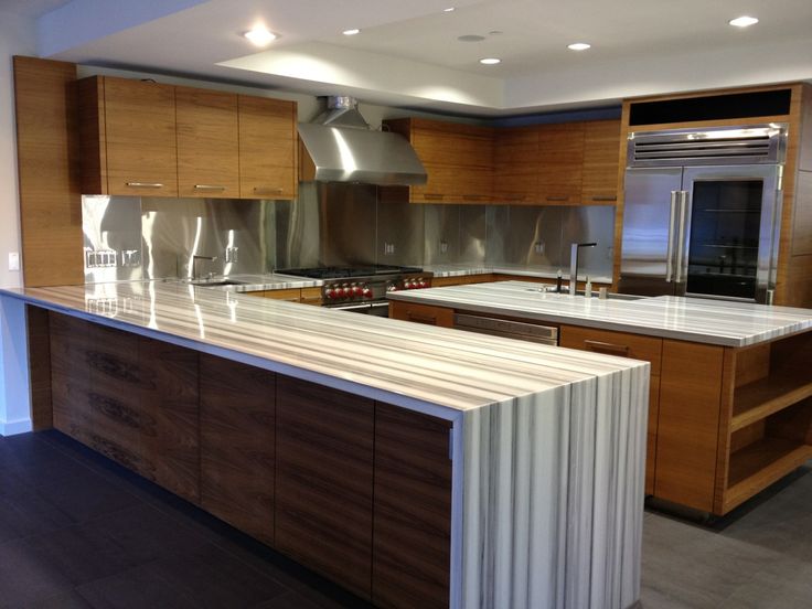 modern kitchen with waterfall counter