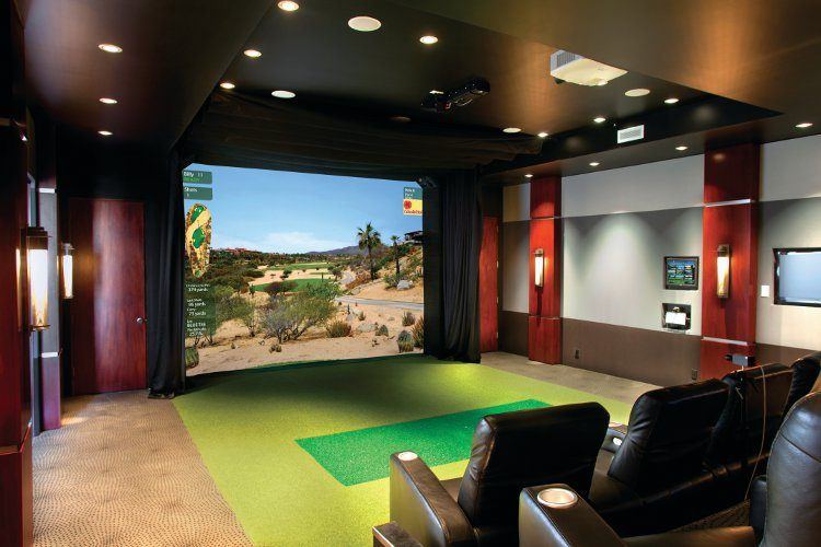 cool home media room with golf green