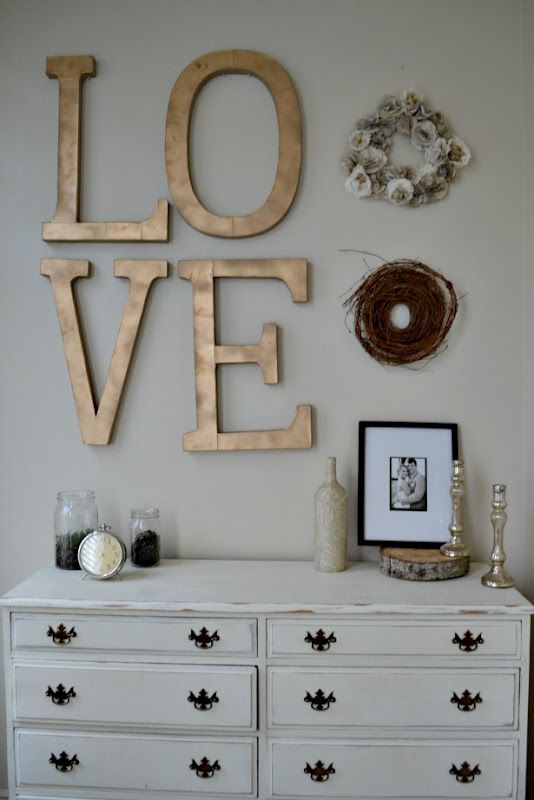 floating gold love sign