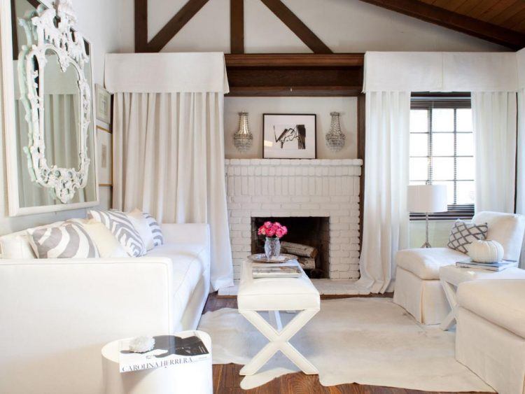 living room with beautiful white brick fireplace