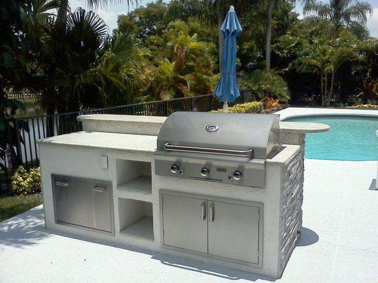 simple kitchen area near swimming pool