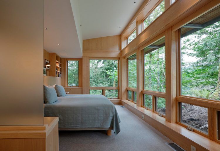 bedroom with wall of windows