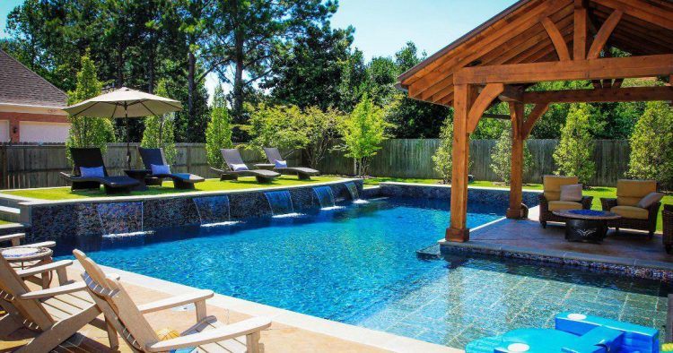 backyard pool area with canopy