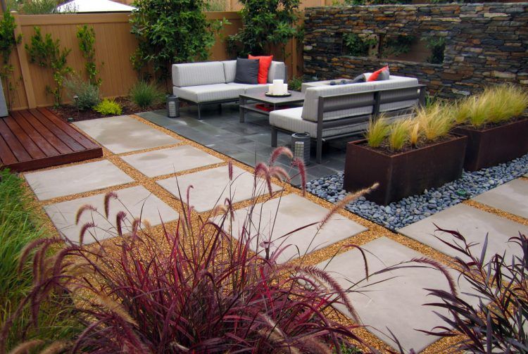 contemporary backyard landscape with couches