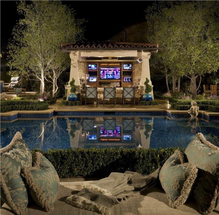 rustic style outdoor kitchen and pool