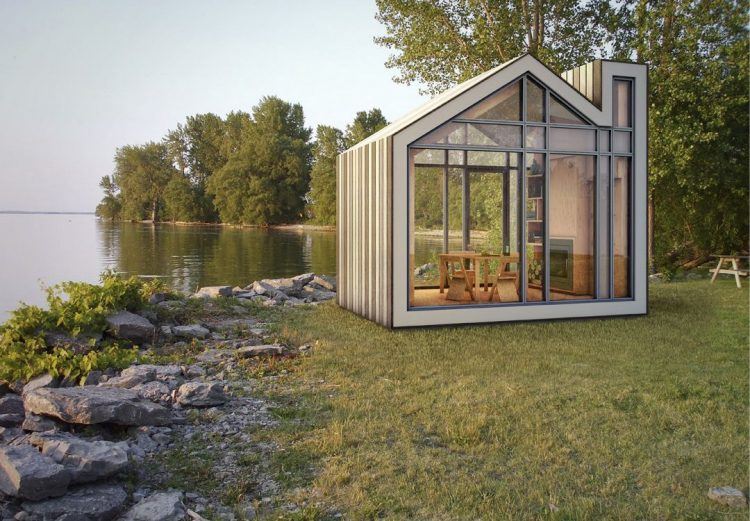 beautiful glass house on a lake